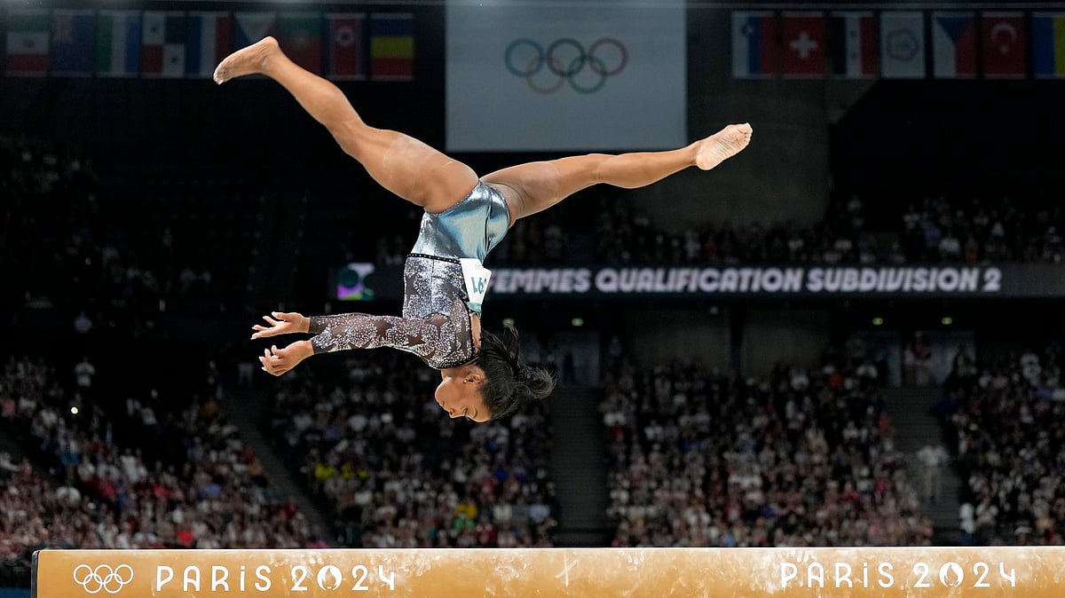 (AP Photo/Abbie Parr)
 : Simone Biles competes on the balance beam during a women's artistic gymnastics qualification round at the 2024 Summer Olympics, Sunday, July 28, 2024, in Paris, France. 

